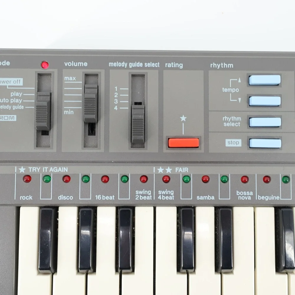 Vintage Casio PT-87 Mini Keyboard & ROM Pack RO-551 World Songs TESTED & WORKING